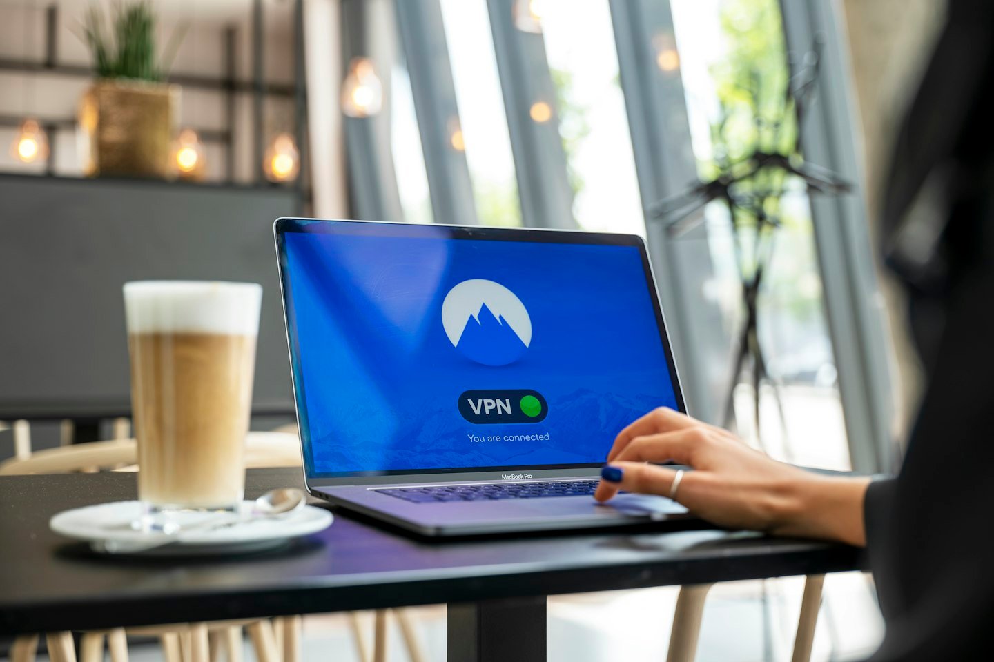 Home Laptop displaying a NordVPN connection graphic
