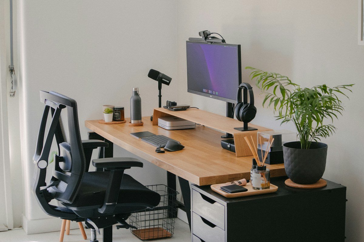 Home office workstation with desk and chair illustrating the importance of seat height and desk fit